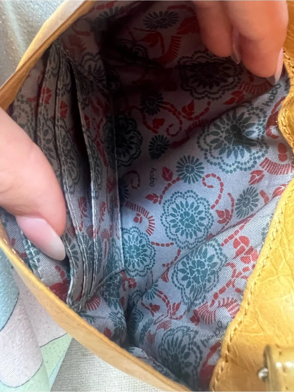 HOBO Leather Wristlet Clutch in Mustard Yellow
